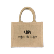 This floral burlap tote is the perfect accessory for Alpha Delta Pi sisters, offering style and practicality for everyday use.