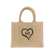 Carry your Alpha Delta Pi spirit with this eco-friendly Heart and Sorority Letters design burlap tote, ideal for Bid Day, Greek life events, and daily use.