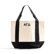 Alpha Gamma Delta Mini Tote Bag – A versatile mini canvas tote displaying Alpha Gamma Delta’s Greek letters and black trim, perfect for carrying essentials on the go.