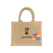 Custom boho burlap bags designed for occasions like bachelorette parties and birthdays. These bags feature vibrant prints made with eco-friendly inks and come with options for tassels and a selection of design motifs.