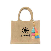 Custom boho burlap bags designed for occasions like bachelorette parties and birthdays. These bags feature vibrant prints made with eco-friendly inks and come with options for tassels and a selection of design motifs.