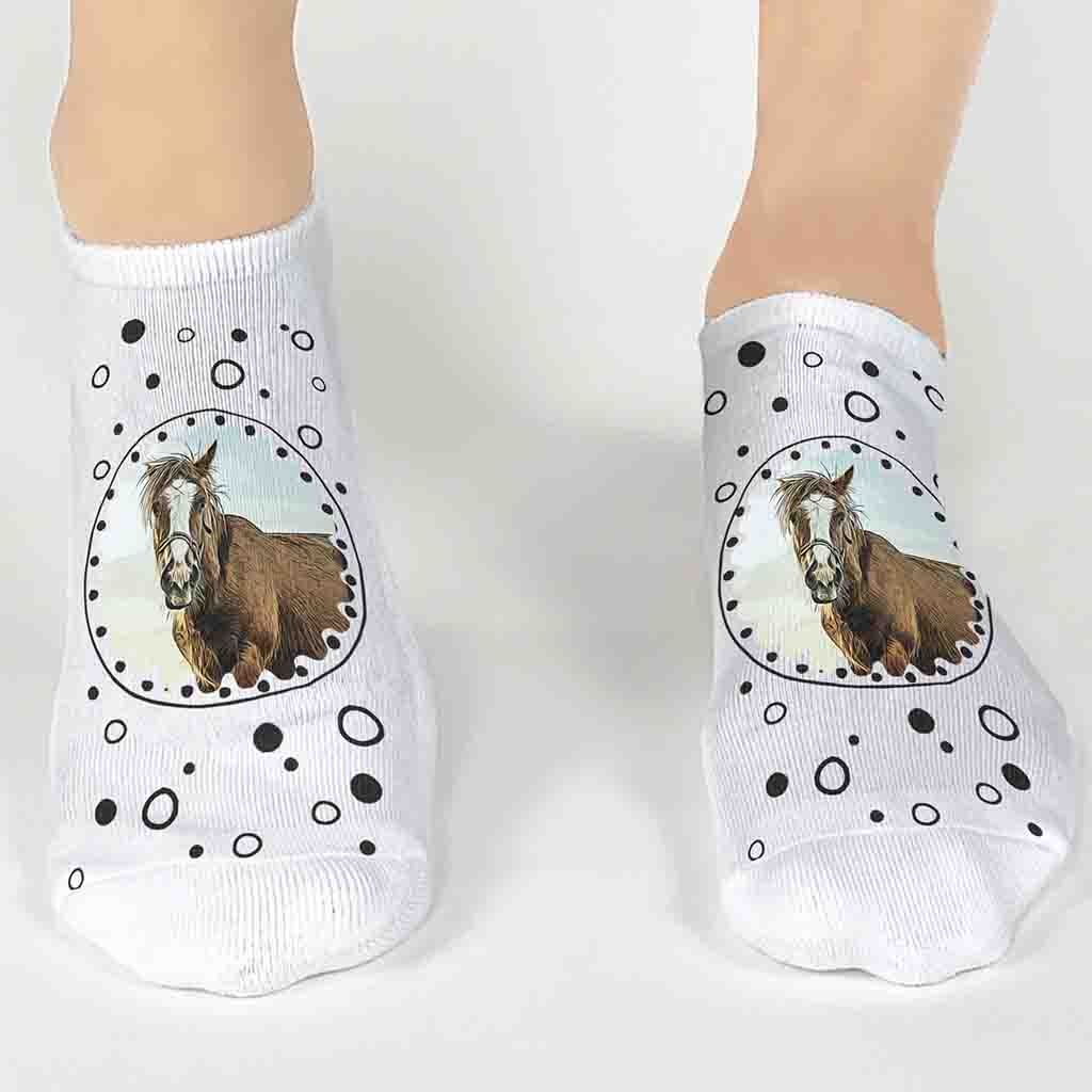 These fun photo socks feature a cartoonized image of your pet or favorite person, framed by a whimsical dotted design