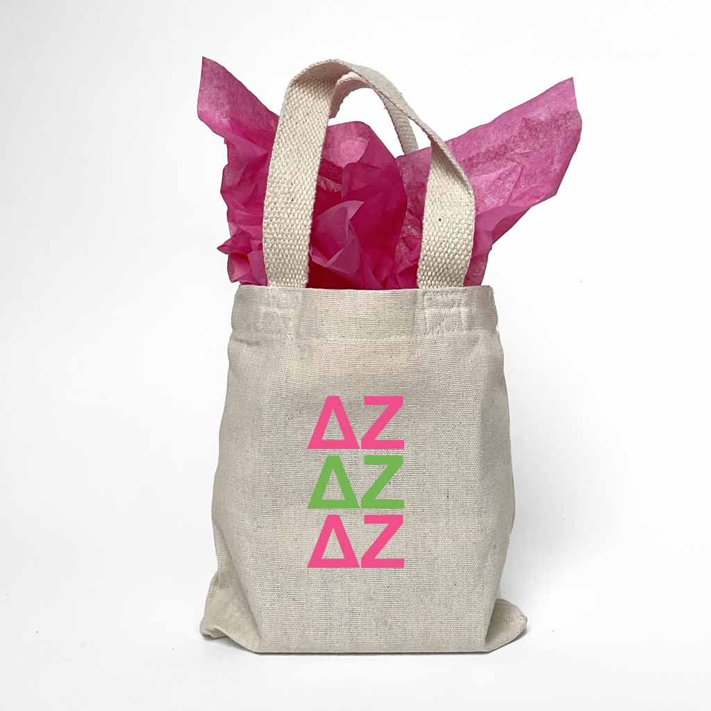 Sorority greek letters printed in sorority colors on natural canvas mini tote gift bag.