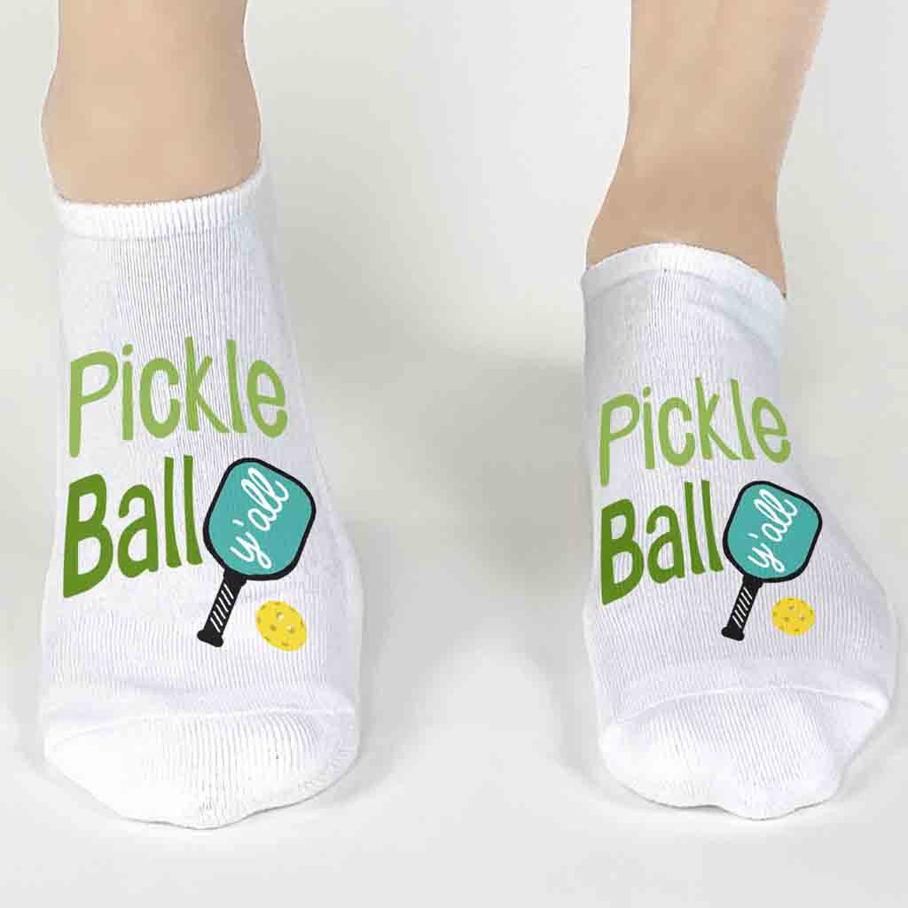 These cute and trendy pickleball gift socks are perfect for the entire family or team! A long lasting design is printed on both socks on a high quality and cushioned no show footie sock.