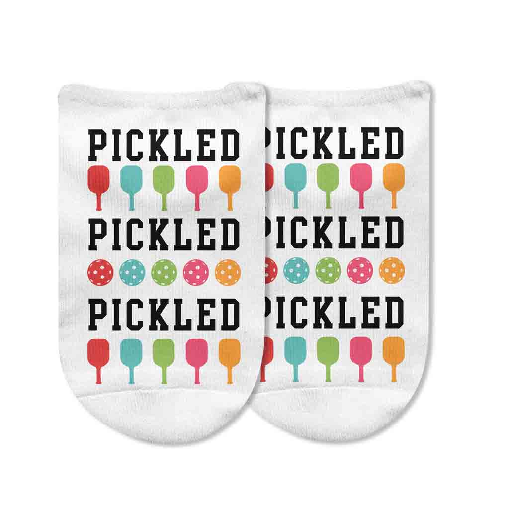 This colorful and cute design is printed on both socks for men and women. A great unisex gift for any pickleball player! 