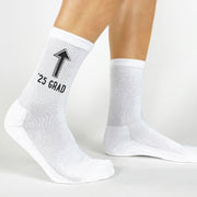 2025 graduation socks with a bold arrow design—pointing to the graduate as they celebrate their success.