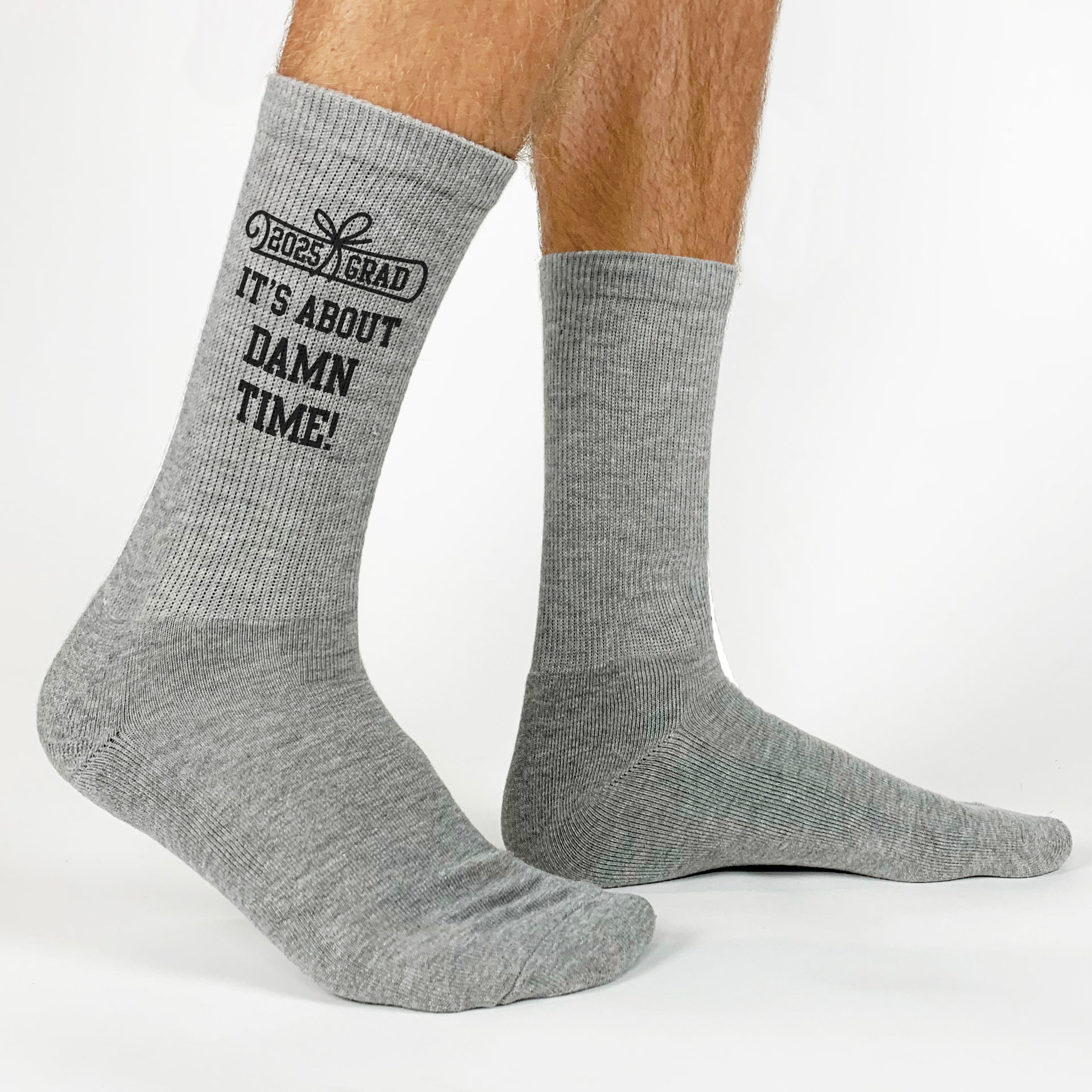 Fun and quirky 'It's About Damn Time' socks for your graduation celebration.