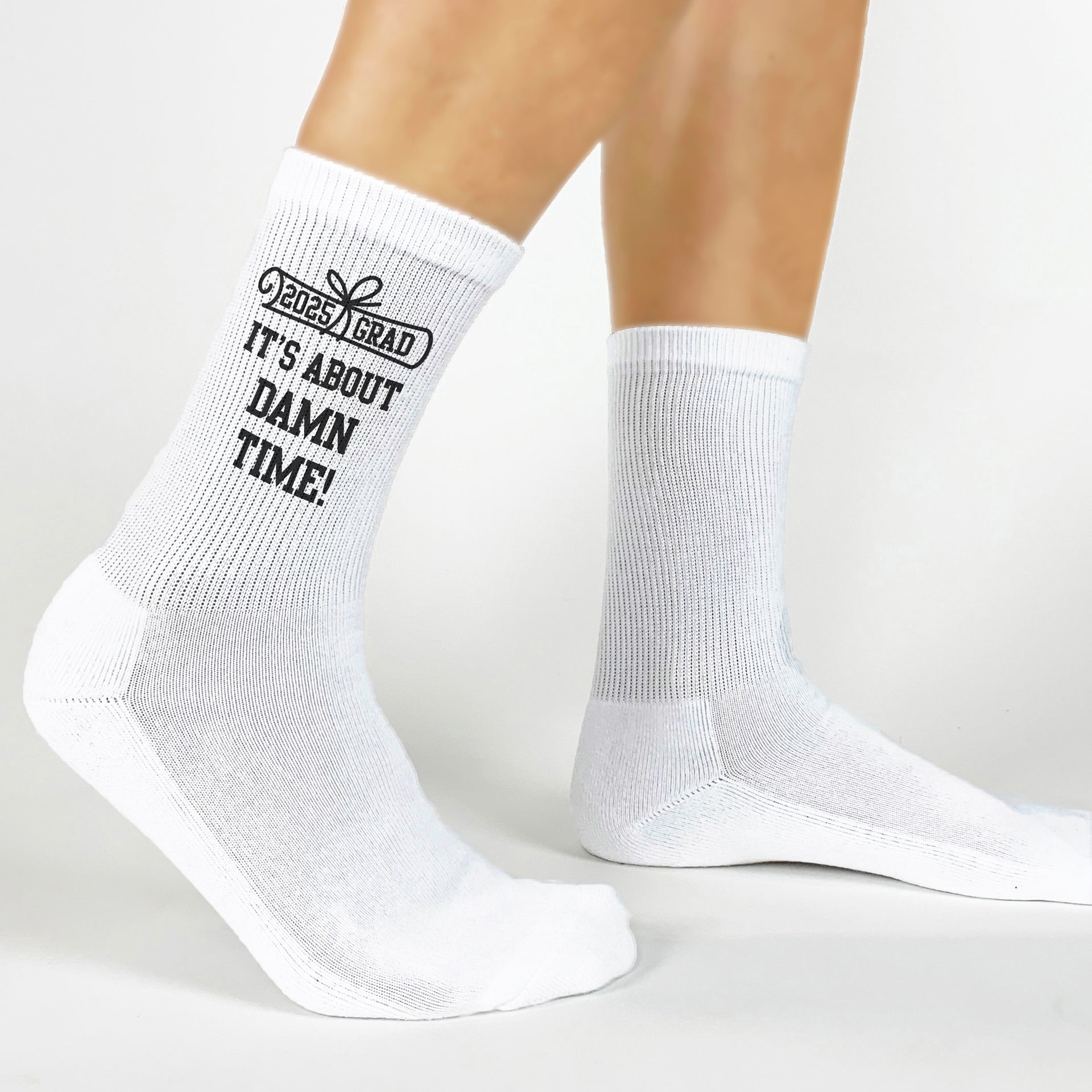 Made to order, 'It's About Damn Time' socks for graduates celebrating their big day.