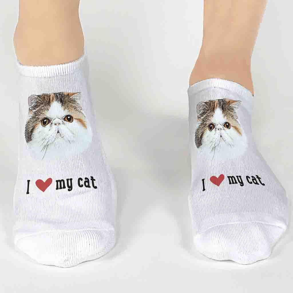 Celebrate your love for your cat with custom no-show socks featuring a cartoonized photo of your kitty and "I heart my cat" printed below.