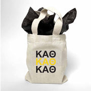 Sorority greek letters printed in sorority colors on natural canvas mini tote gift bag.