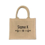 Show off your Sigma Kappa spirit with this floral burlap tote, designed for sorority events and everyday use.