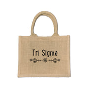 Embrace your Sigma Sigma Sigma pride with this beautiful floral burlap tote, ideal for everyday sorority use and special events.