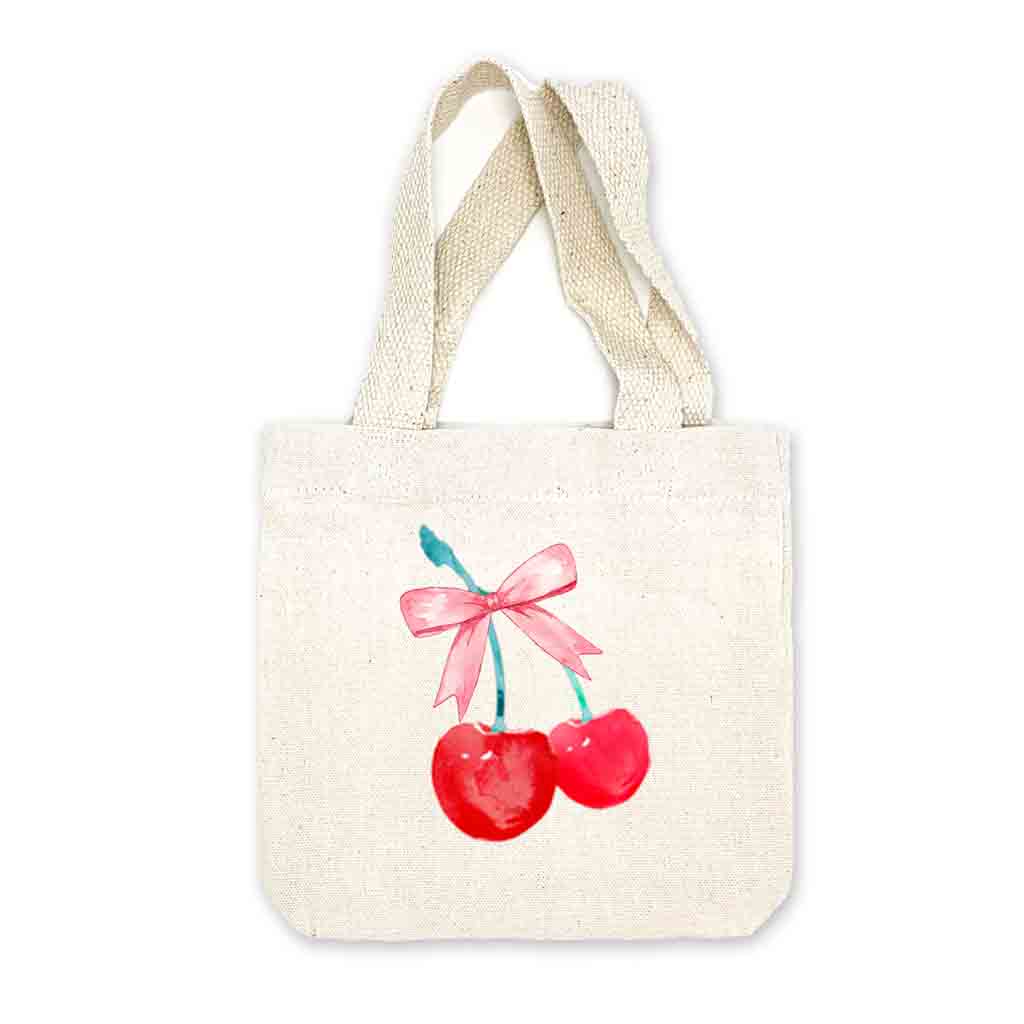 Gift-ready canvas totes with red cherry and pink bow designs