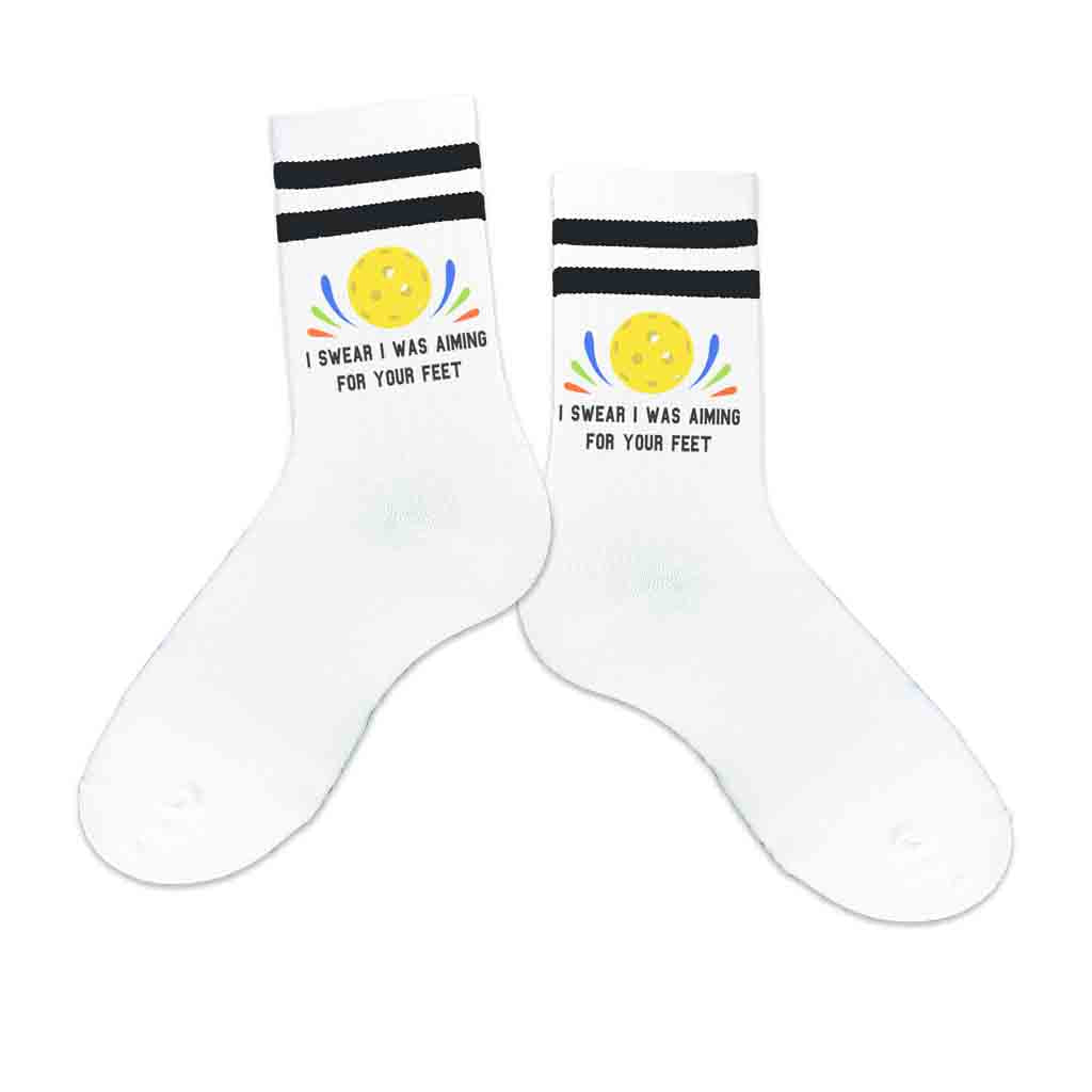 Our white and black striped cushioned crew is comfortable and cute! Grab the perfect gift for any pickleball player in your life! Hit the court in these funny pickleball socks for him and her!
