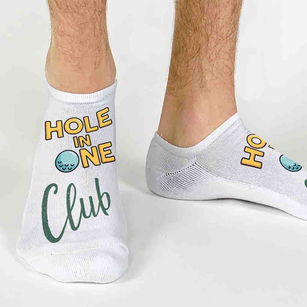 This is the club that every golfer wants to be in, and when you do make it, these socks say it all., hole in one club design digitally printed on the top of the white cotton no show socks.