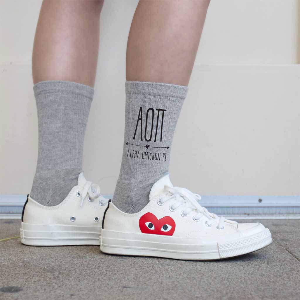 Alpha Omicron Pi sorority letters and name digitally printed on crew socks.